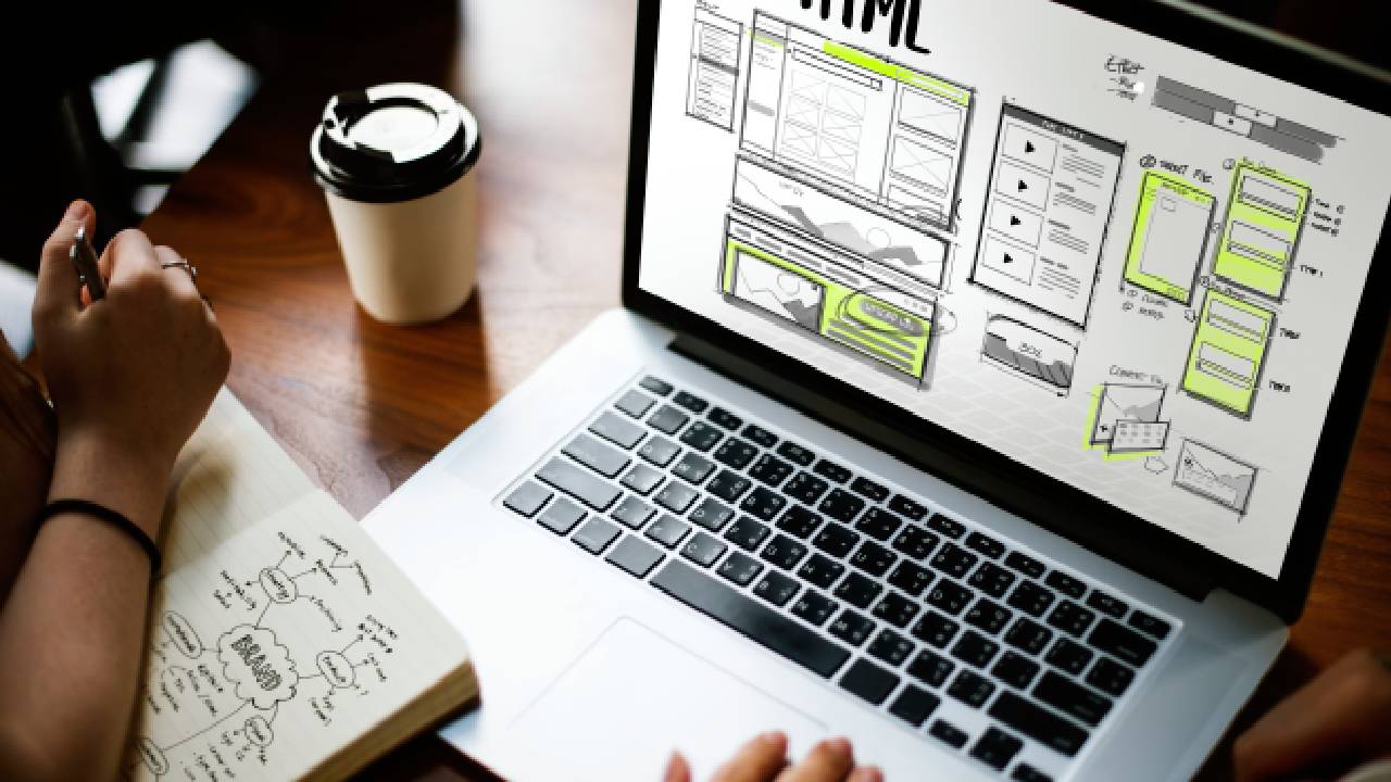 web design and development process on a laptop screen