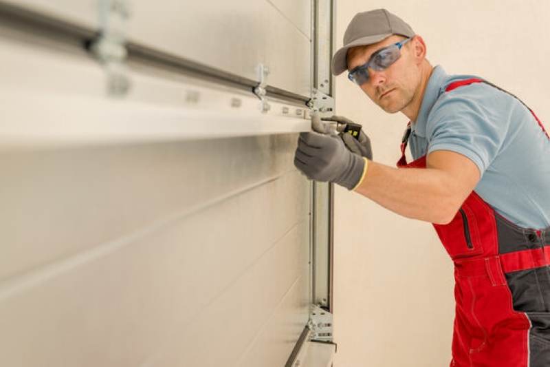 What Leads to Most Garage Door Dents Repair in Bartlett?